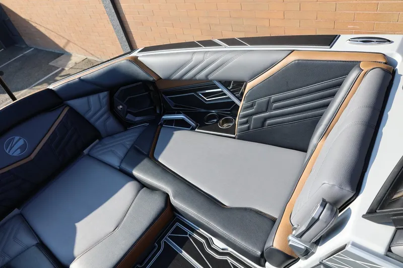 Slide: The Image of 2026 Tigé Ultré 25ZX boat interior with luxurious seating and modern design. - 57