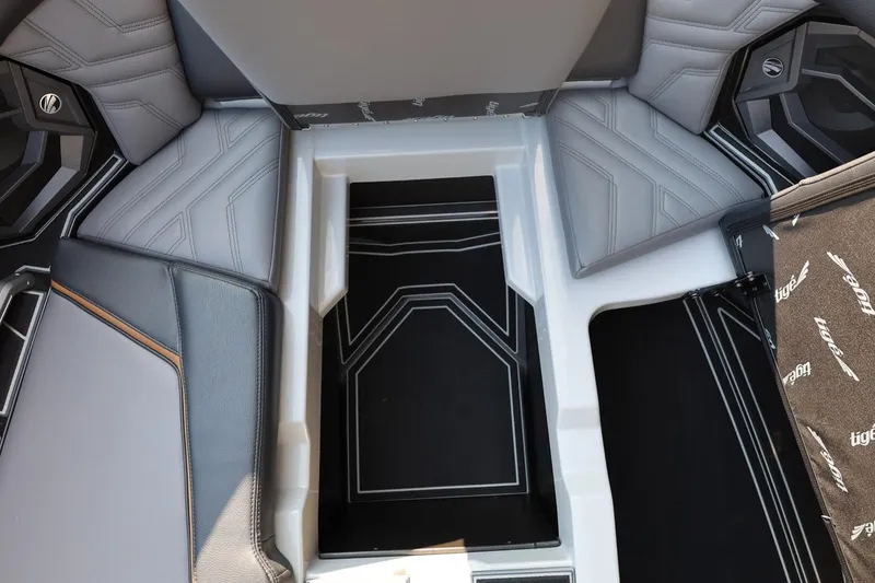 Slide: The Image of 2026 Tigé Ultré 25ZX interior with sleek, modern seating and stylish design elements. - 59