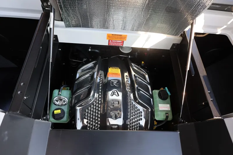 Slide: The Image of Engine compartment of 2026 Tigé Ultré 25ZX boat, featuring a powerful Raptor engine. - 65
