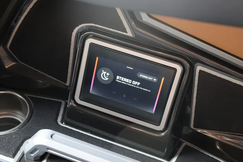 Slide: The Image of Touchscreen control panel in 2026 Tigé Ultré 25ZX boat, displaying "Stereo Off" message. - 73