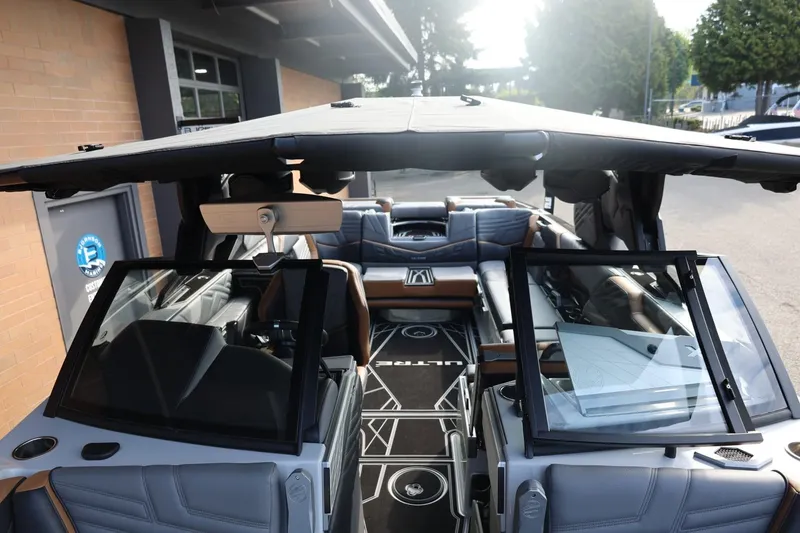 Slide: The Image of 2026 Tigé Ultré 25ZX boat interior with modern seating and sleek design. - 75