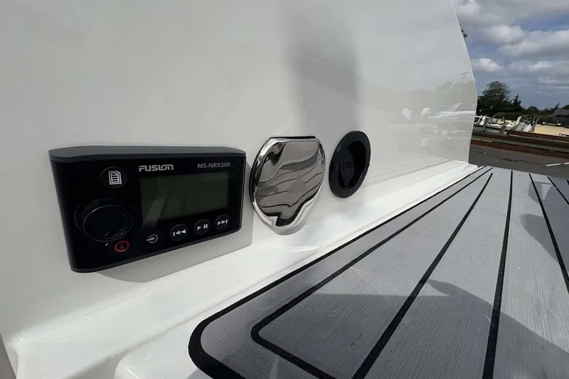 Slide: The Image of 2017 Monterey 298SS boat with Fusion MS-NRX300 stereo system on deck. - 15