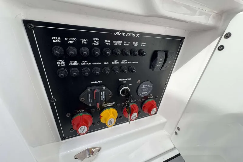 Slide: The Image of Control panel of a 2017 Monterey 298SS boat with various switches and dials. - 16