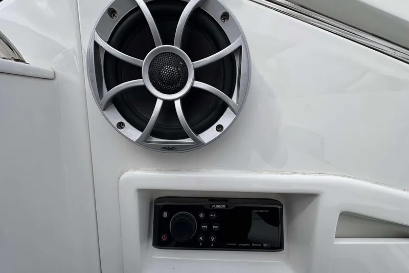 Slide: The Image of Speaker and control panel on a 2017 Monterey 298SS boat. - 17