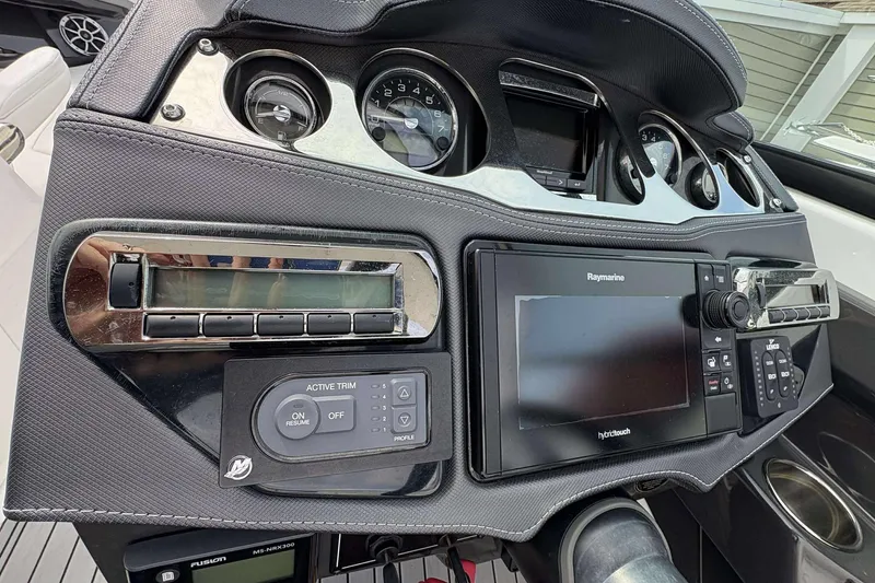 Slide: The Image of Dashboard of a 2017 Monterey 298SS boat with navigation and control systems. - 20