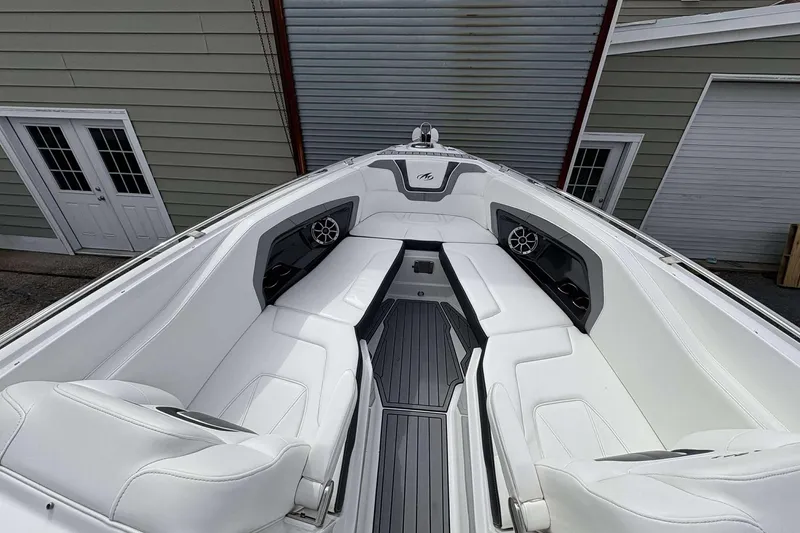 Slide: The Image of 2017 Monterey 298SS boat interior with white seating and modern design. - 5