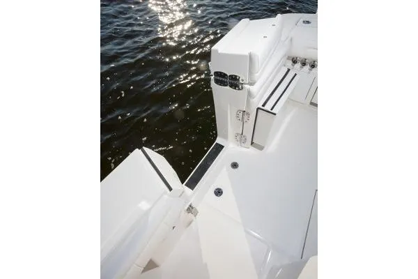Slide: The Image of 2021 Regulator 34 Center Console boat deck with water reflection. - 12