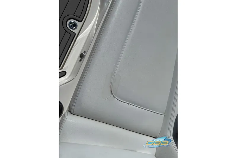 Slide: The Image of 2014 Sea Ray 260 Sundeck interior seat detail with light gray upholstery. - 33