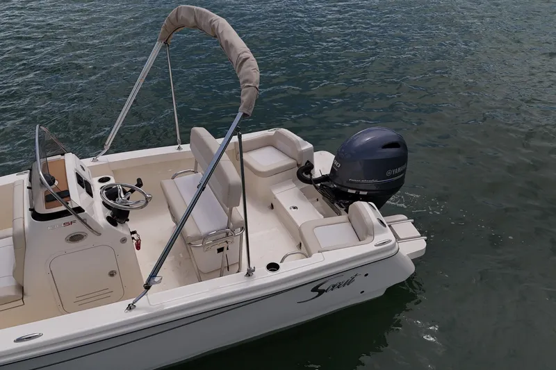 Slide: The Image of 2026 Scout 188 Sportfish boat with Yamaha outboard motor on water. - 14