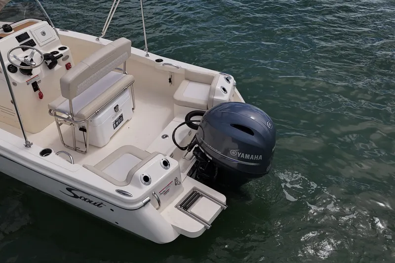 Slide: The Image of 2026 Scout 188 Sportfish boat with Yamaha outboard motor on water. - 17