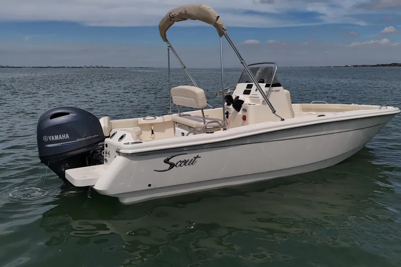 Slide: The Image of 2026 Scout 188 Sportfish boat with Yamaha engine on calm water. - 6