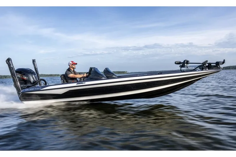 Slide: The Image of Manufacturer Provided Image: 2025 Skeeter ZXR21 boat speeding on open water, showcasing sleek design and performance. - 18