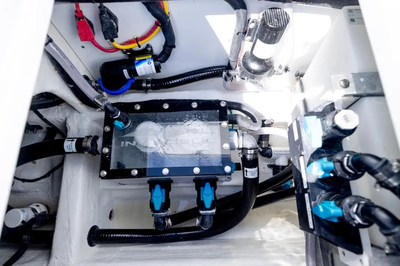 Slide: The Image of Engine compartment of 2026 Invincible 33 Catamaran showcasing wiring and components. - 40