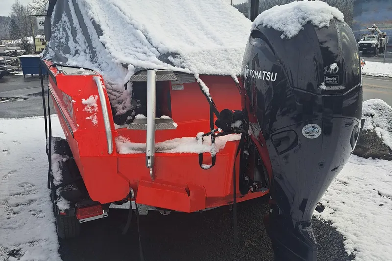 Slide: The Image of 2024 Stabicraft 2050 Supercab Sportfisher with Tohatsu engine, covered in snow. - 6