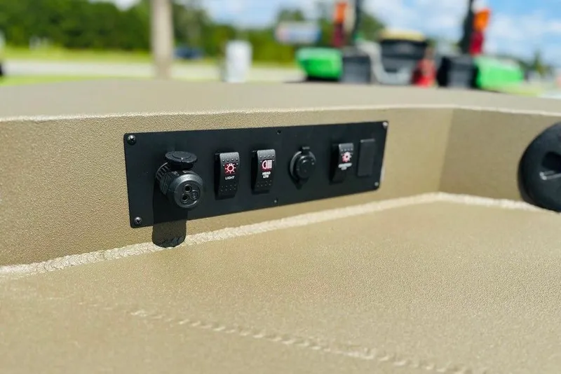 Slide: The Image of Control panel on 2025 Thor 1900 Lake Hammer boat, featuring switches and outlets. - 5