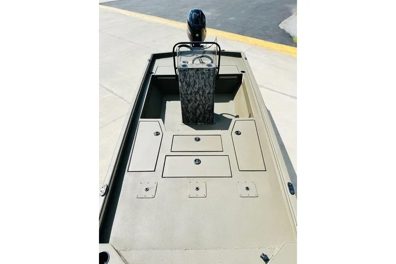 Slide: The Image of 2025 Thor 1900 Lake Hammer boat interior with storage compartments and steering console. - 7