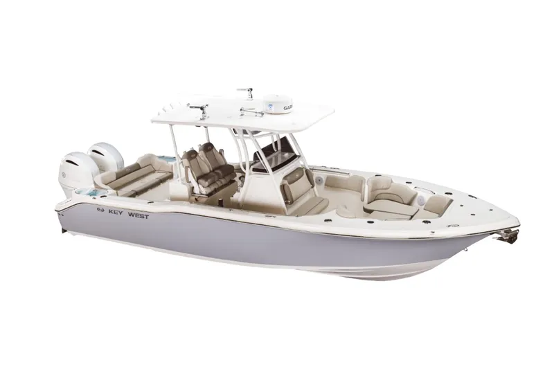 Slide: The Image of 2023 Key West 263 FS boat interior with cushioned seating and storage compartments. - 11