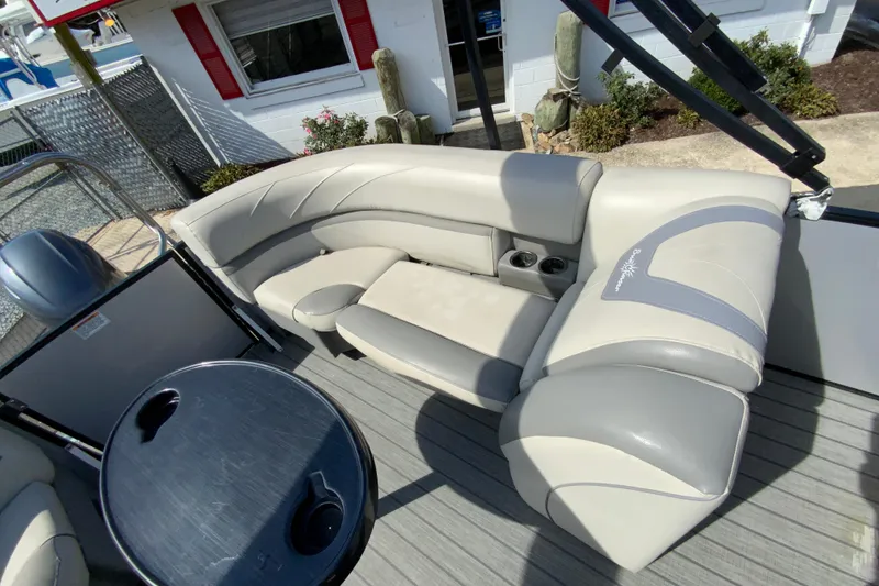 Slide: The Image of 2019 SunChaser Geneva Cruise 24 LR DH Sport pontoon boat with comfortable seating and cup holders. - 13