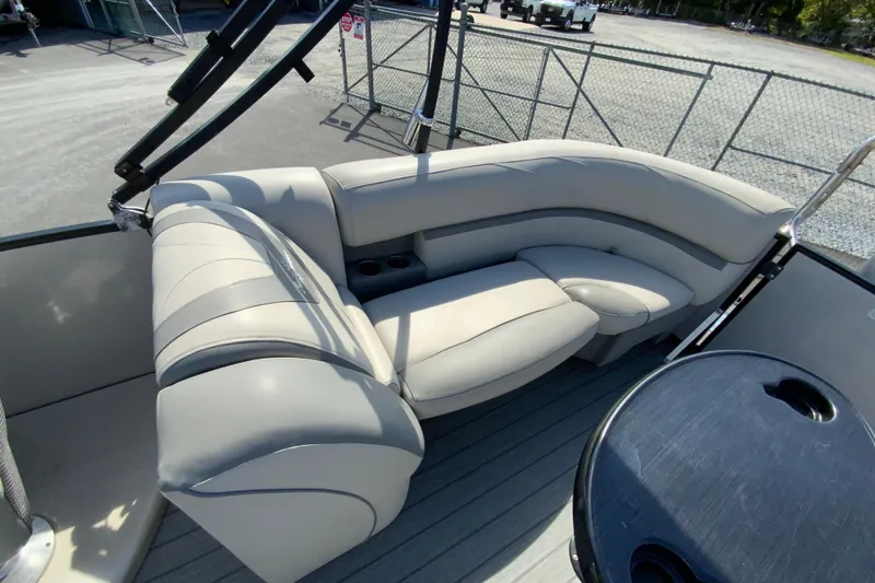 Slide: The Image of Luxurious seating on 2019 SunChaser Geneva Cruise 24 LR DH Sport pontoon boat. - 14