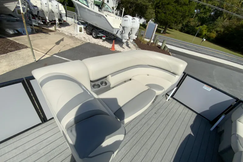 Slide: The Image of 2019 SunChaser Geneva Cruise 24 LR DH Sport pontoon boat with plush seating. - 18