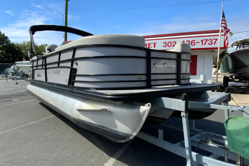 Slide: The Image of 2019 SunChaser Geneva Cruise 24 LR DH Sport pontoon boat on trailer. - 3