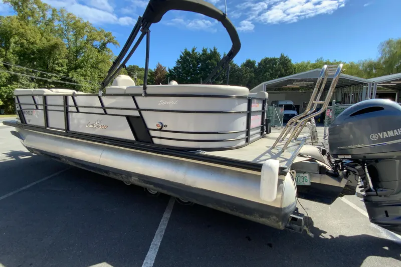 Slide: The Image of 2019 SunChaser Geneva Cruise 24 LR DH Sport pontoon boat with Yamaha outboard motor. - 6