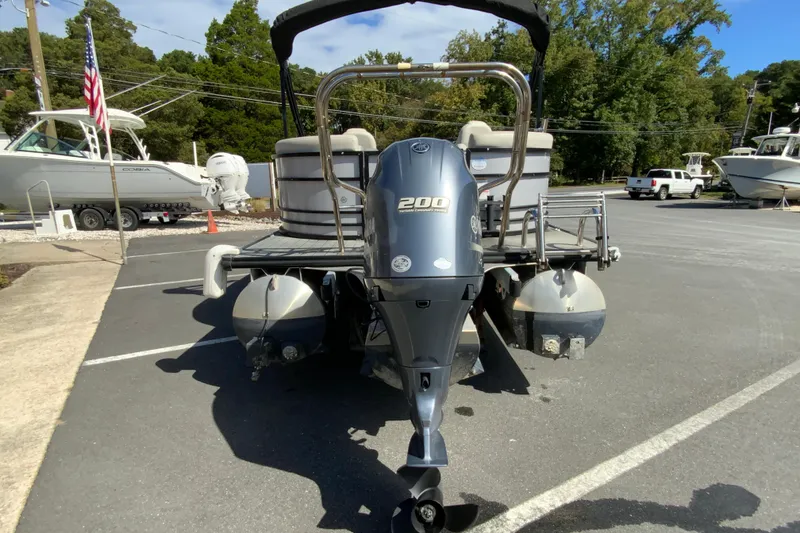 Slide: The Image of 2019 SunChaser Geneva Cruise 24 LR DH Sport pontoon boat with powerful 200 HP engine. - 8