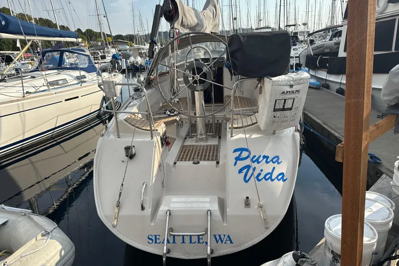 Slide: The Image of 1985 Dehler 372 sailboat "Pura Vida" docked in Seattle marina. - 2