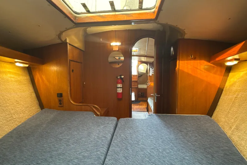 Slide: The Image of Interior of 1985 Dehler 372 sailboat with cozy wooden cabin and skylight. - 34