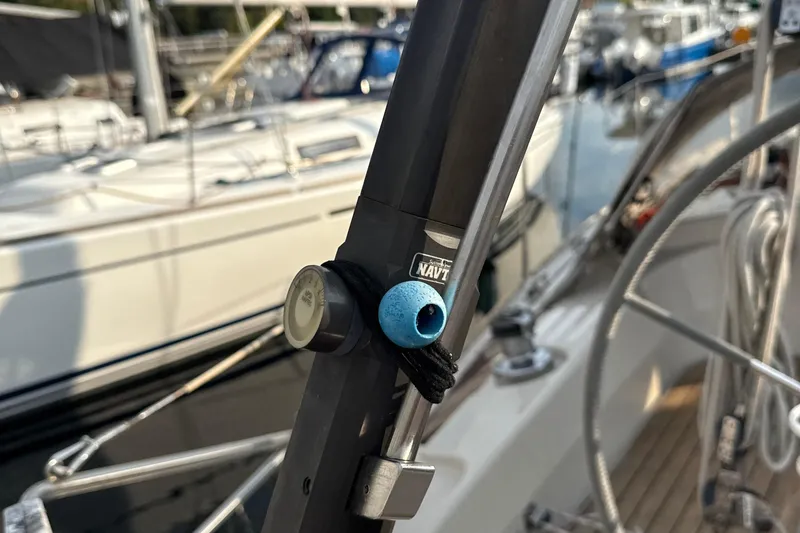 Slide: The Image of Close-up of a 1985 Dehler 372 sailboat's rigging and equipment at a marina. - 45