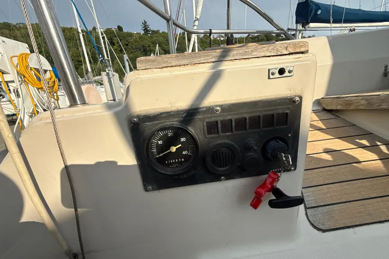 Slide: The Image of Control panel of a 1985 Dehler 372 sailboat with gauges and switches. - 49