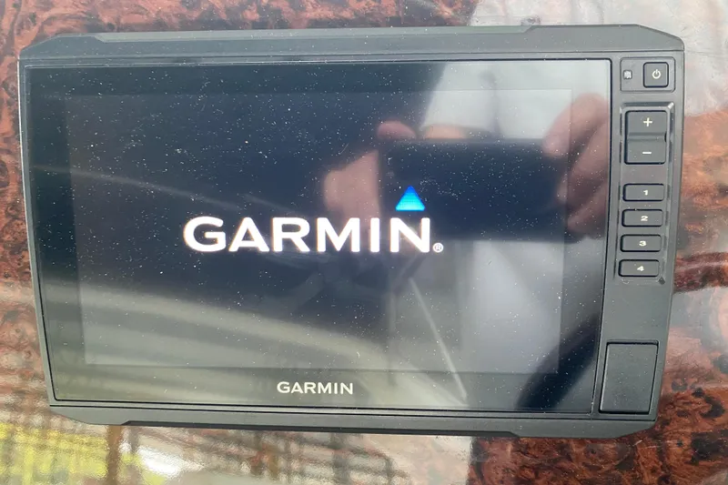 Slide: The Image of Garmin navigation system on 2004 Regal Commodore 3560 boat dashboard. - 20