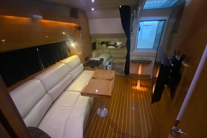 Slide: The Image of Luxurious interior of 2004 Regal Commodore 3560 yacht with plush seating and modern amenities. - 38
