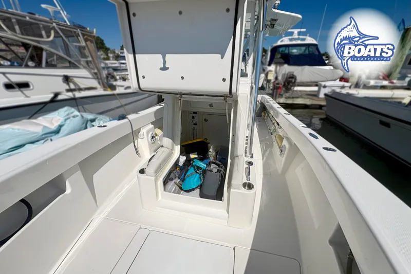 Slide: The Image of 2022 SeaVee 290B boat interior with storage compartment at marina. - 7