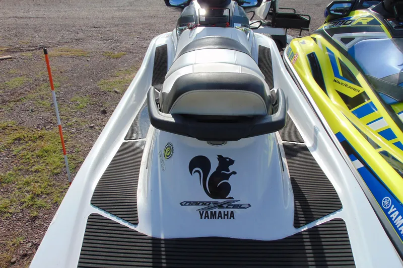 Slide: The Image of 2017 Yamaha WaveRunner VX Cruiser HO with custom graphics, parked on gravel. - 4