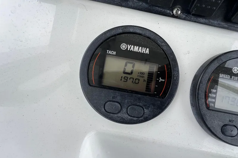 Slide: The Image of Yamaha tachometer on 2016 Sea Hunt Ultra 225 boat, displaying 1970 hours. - 10