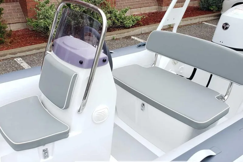 Slide: The Image of Interior of Gala A400L boat, 2025 model, featuring gray seating. - 7