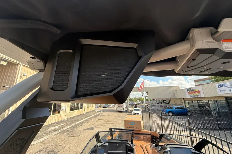 Slide: The Image of 2026 Supra SA 450 boat interior with advanced speaker system and sleek design. - 12