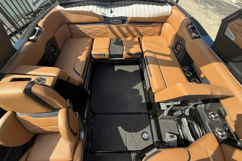 Slide: The Image of Luxurious interior of 2026 Supra SA 450 boat with tan leather seating. - 6