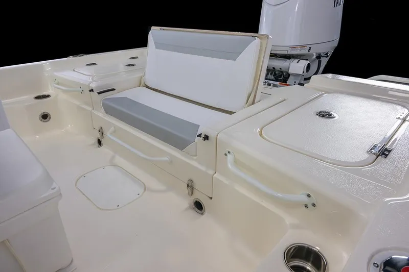 Slide: The Image of Manufacturer Provided Image: 2026 Skeeter SX221 boat interior with seating and storage compartments. - 17