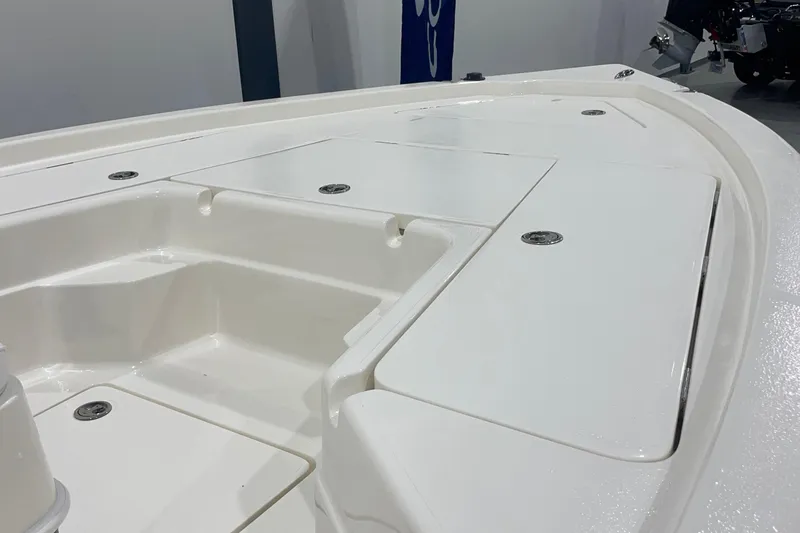 Slide: The Image of 2026 Skeeter SX221 boat deck with storage compartments, showcasing sleek design and functionality. - 4