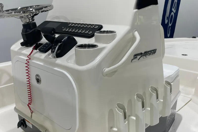 Slide: The Image of 2026 Skeeter SX221 boat console with steering wheel and control panel. - 5