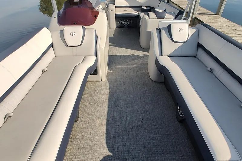 Slide: The Image of 2023 Tahoe Pontoon Cascade Funship interior with spacious seating and modern design. - 13