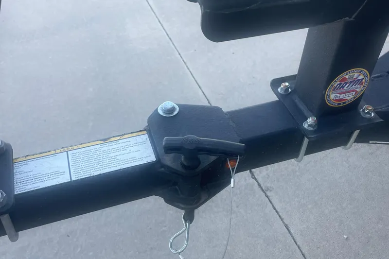 Slide: The Image of Trailer hitch of 2017 Tracker Pro Team 175 TXW boat on concrete surface. - 11