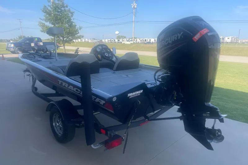 Slide: The Image of 2017 Tracker Pro Team 175 TXW boat with Mercury outboard motor on trailer. - 3