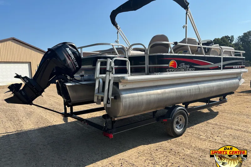 Slide: The Image of 2014 Sun Tracker Fishin' Barge 20 DLX pontoon boat with Mercury outboard motor. - 5