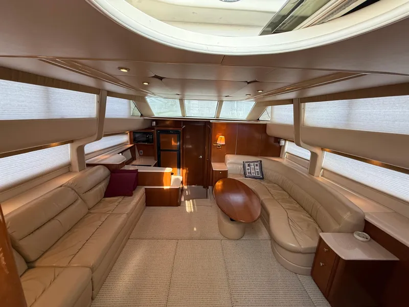Slide: The Image of Luxurious interior of a 2005 Meridian 459 Motoryacht with elegant seating and natural lighting. - 23