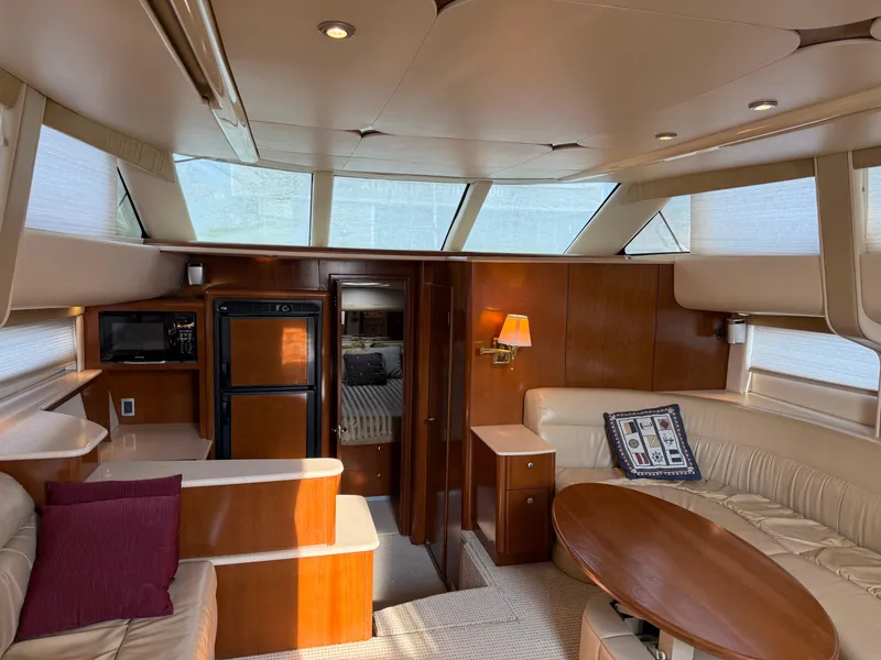 Slide: The Image of Luxurious interior of a 2005 Meridian 459 Motoryacht with elegant seating and modern amenities. - 24