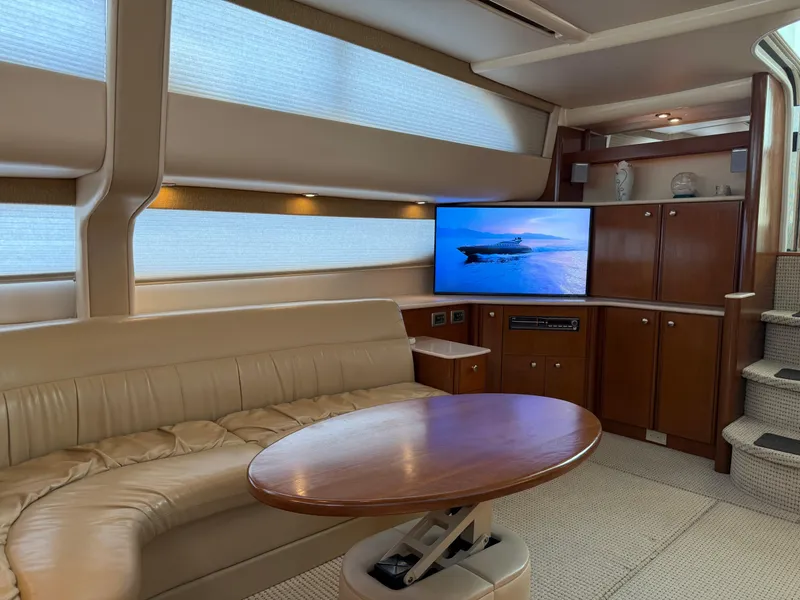 Slide: The Image of Luxurious interior of 2005 Meridian 459 Motoryacht with leather seating and TV. - 27