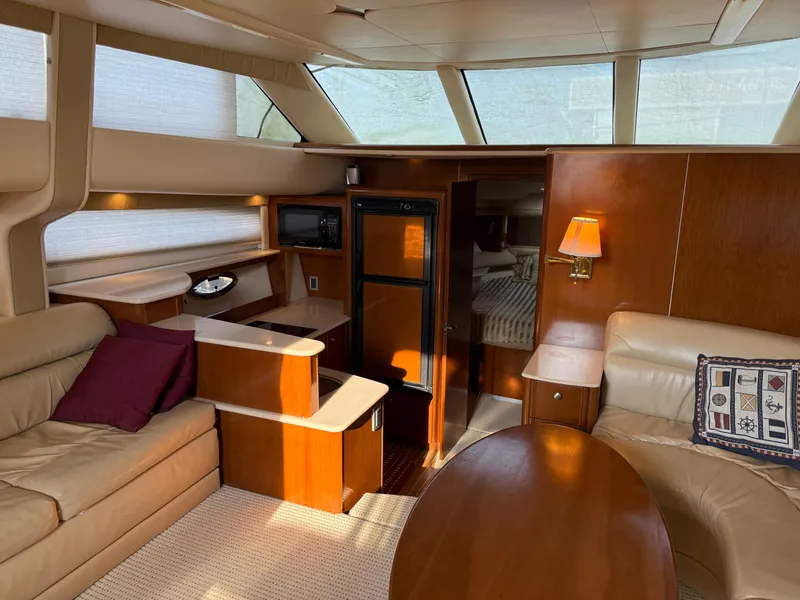 Slide: The Image of Luxurious interior of 2005 Meridian 459 Motoryacht with leather seating and wood finishes. - 28